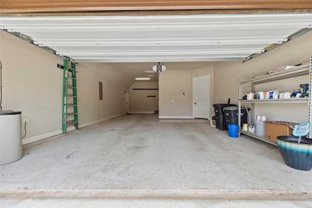 15306 Guava Vis, Conroe, TX 77302 - garage featuring a garage door opener, water heater, and electric panel