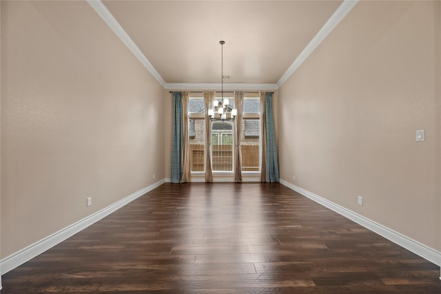 15306 Guava Vis, Conroe, TX 77302 - unfurnished dining area featuring ornamental molding, a chandelier, baseboards, and dark wood finished floors