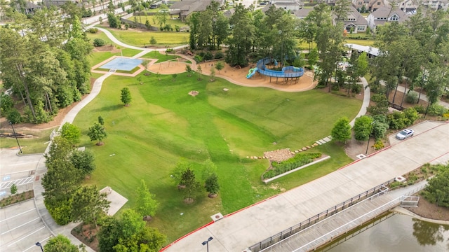 15306 Guava Vis, Conroe, TX 77302 - aerial perspective of suburban area featuring a nearby body of water