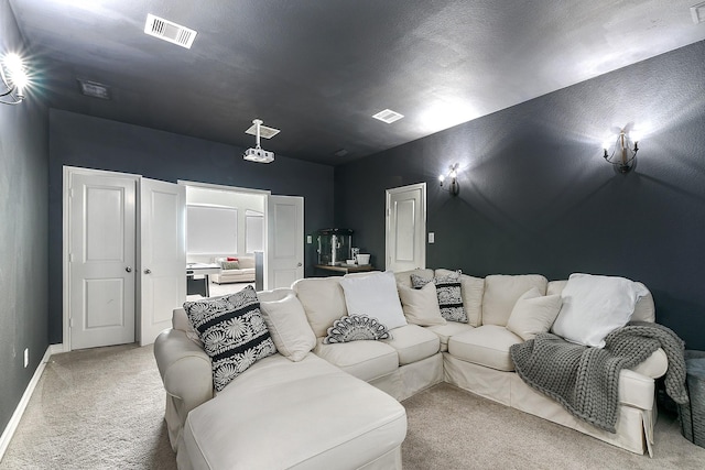 2502 Crossvine Dr, Katy, TX 77494 - cinema featuring baseboards, visible vents, and light carpet