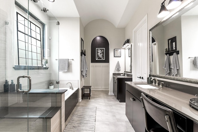 2502 Crossvine Dr, Katy, TX 77494 - bathroom featuring a garden tub, a sink, two vanities, and a shower stall