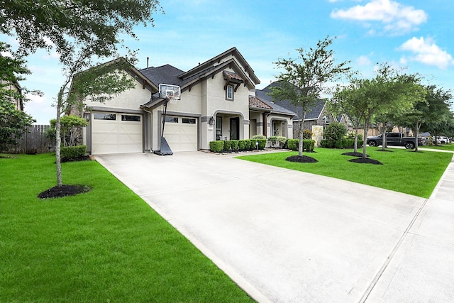 2502 Crossvine Dr, Katy, TX 77494 - view of front of property featuring driveway, a front lawn, and stucco siding
