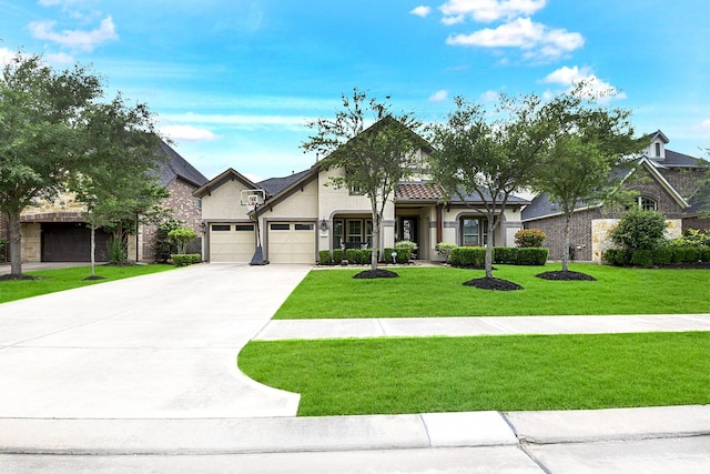 2502 Crossvine Dr, Katy, TX 77494 - view of front of house with a garage, stucco siding, concrete driveway, and a front yard