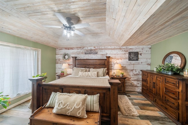 bedroom featuring vaulted ceiling, wooden ceiling, and wood finished floors