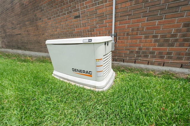 exterior details with brick siding and a power unit