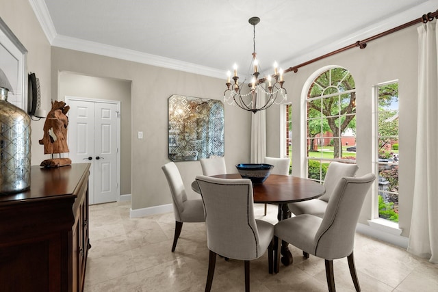dining room with an inviting chandelier, baseboards, crown molding, and a healthy amount of sunlight