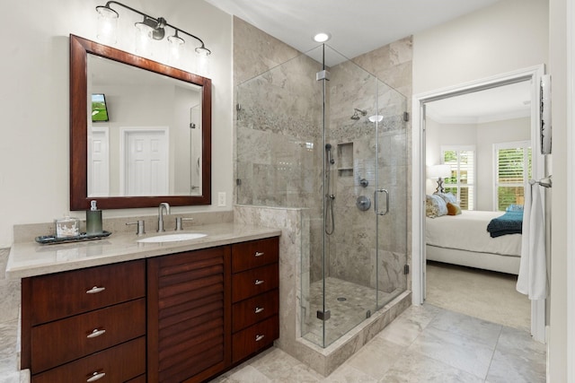 bathroom with crown molding, vanity, ensuite bathroom, and a stall shower