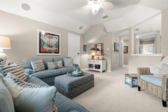 living room featuring a ceiling fan, visible vents, vaulted ceiling, baseboards, and carpet