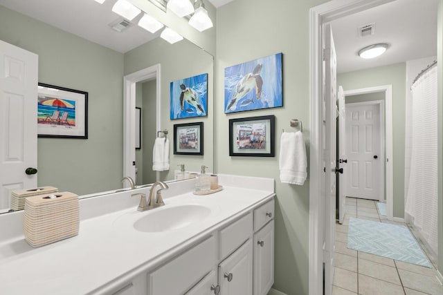 bathroom with vanity, tile patterned flooring, a shower with shower curtain, and visible vents