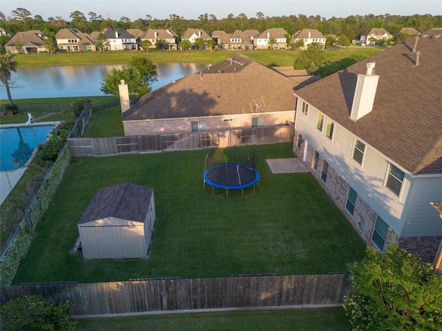 bird's eye view with a water view and a residential view