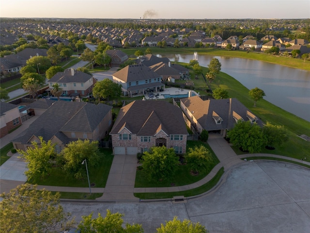 aerial view featuring a water view and a residential view