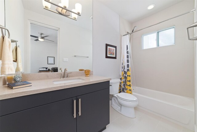 full bath with a ceiling fan, tile patterned floors, vanity, toilet, and shower / bath combo with shower curtain