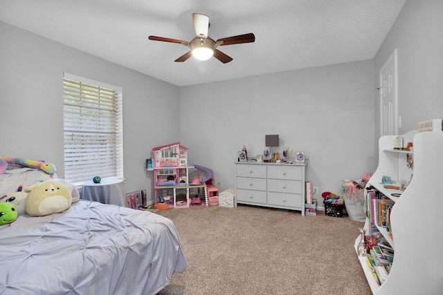 bedroom with carpet floors and a ceiling fan