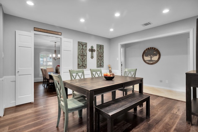 dining space with recessed lighting, dark wood-style flooring, a chandelier, and visible vents
