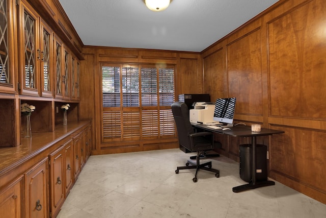 office area with wood walls