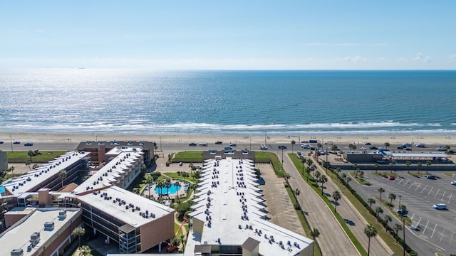 bird's eye view with a beach view and a water view