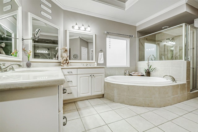 bathroom with double vanity, a bath, a stall shower, a sink, and tile patterned floors