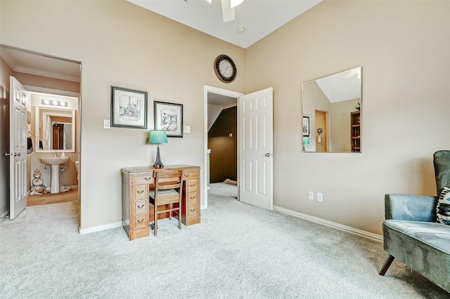 sitting room with baseboards and carpet