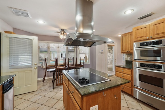 6625 E Post Rd, Kyle, TX 78640 - kitchen featuring visible vents, stainless steel double oven, black electric cooktop, and island range hood