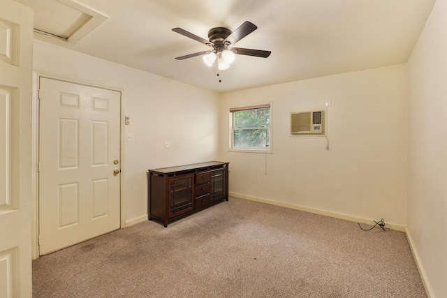 6625 E Post Rd, Kyle, TX 78640 - empty room with light colored carpet, a ceiling fan, baseboards, and attic access