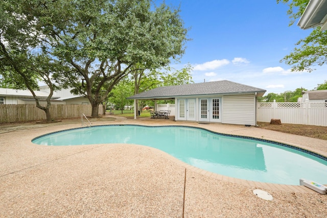6625 E Post Rd, Kyle, TX 78640 - view of pool featuring a fenced in pool, french doors, a fenced backyard, and a patio area