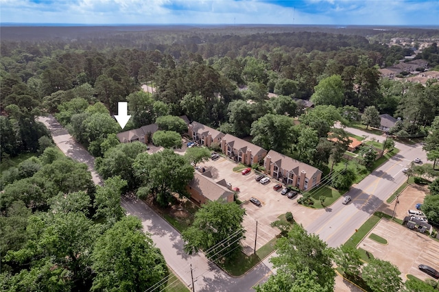 aerial view with a wooded view