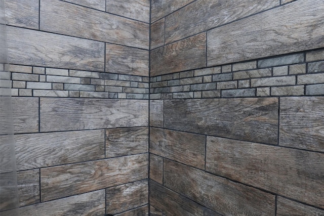 details featuring a tile shower