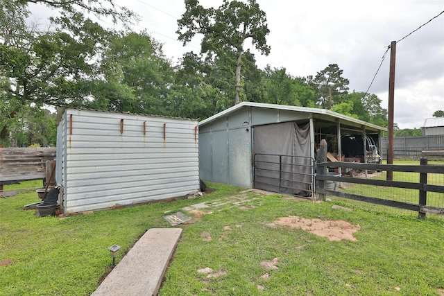 view of outbuilding featuring an exterior structure and an outbuilding