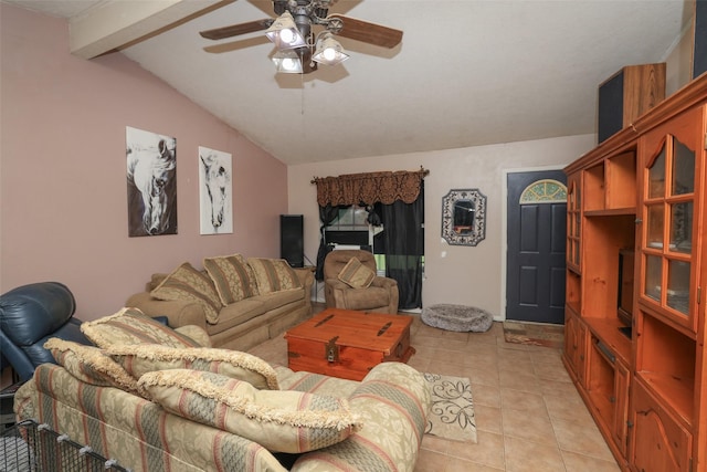 living room featuring lofted ceiling with beams, ceiling fan, and light tile patterned floors