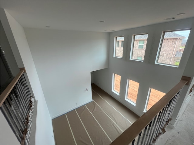 27111 Bel Air Point Ln, Katy, TX 77493 - stairway featuring baseboards and visible vents