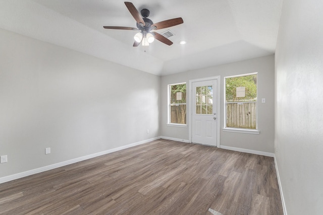 spare room featuring visible vents, wood finished floors, baseboards, recessed lighting, and a ceiling fan