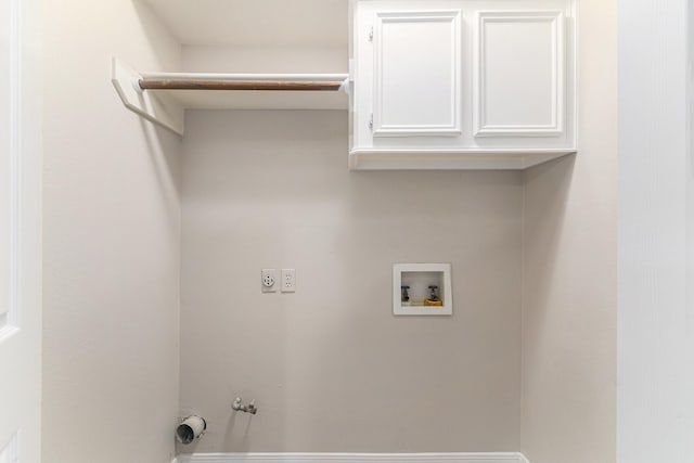 laundry room with cabinet space, electric dryer hookup, gas dryer hookup, and hookup for a washing machine