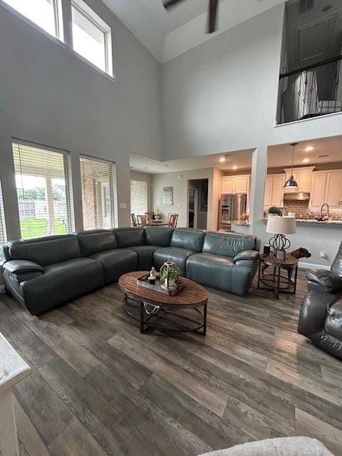 15419 Greenford Glen Dr, Cypress, TX 77429 - living area with a wealth of natural light, high vaulted ceiling, and wood finished floors