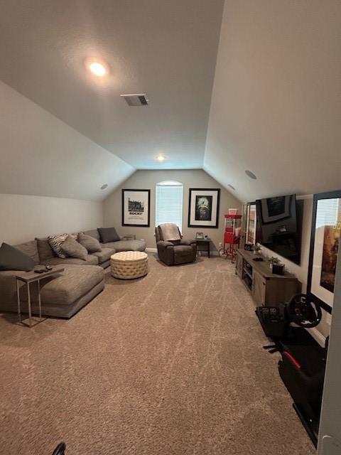 15419 Greenford Glen Dr, Cypress, TX 77429 - living room with vaulted ceiling, visible vents, and carpet floors