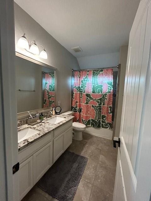 15419 Greenford Glen Dr, Cypress, TX 77429 - bathroom with a sink, double vanity, toilet, and shower / bath combo with shower curtain
