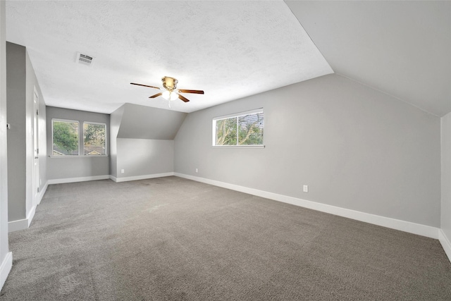 1226 Westgreen Blvd, Katy, TX 77450 - additional living space featuring visible vents, a ceiling fan, lofted ceiling, and a wealth of natural light