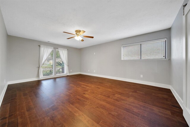 1226 Westgreen Blvd, Katy, TX 77450 - empty room featuring baseboards, a ceiling fan, and wood finished floors