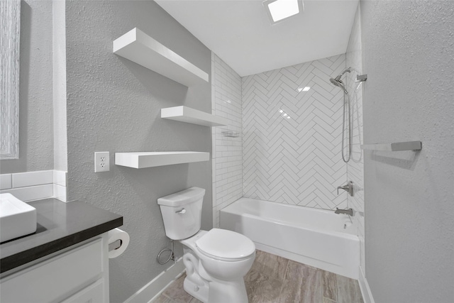 1226 Westgreen Blvd, Katy, TX 77450 - full bathroom with shower / tub combination, vanity, baseboards, toilet, and a textured wall