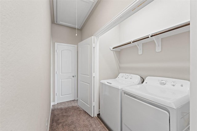 laundry room featuring carpet floors, laundry area, attic access, and washing machine and clothes dryer