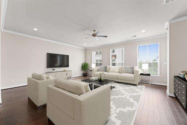 living room featuring crown molding, ceiling fan, baseboards, and dark wood-type flooring