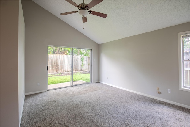 11306 Chiselhurst Way Ct, Houston, TX 77065 - empty room with carpet flooring, ceiling fan, baseboards, and high vaulted ceiling