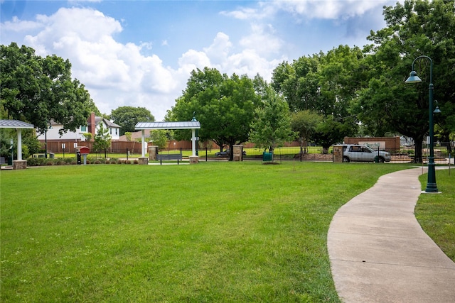 11306 Chiselhurst Way Ct, Houston, TX 77065 - view of community featuring a lawn and fence