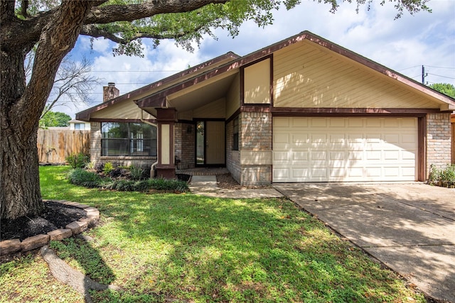 11306 Chiselhurst Way Ct, Houston, TX 77065 - mid-century modern home with brick siding, driveway, fence, and a front yard