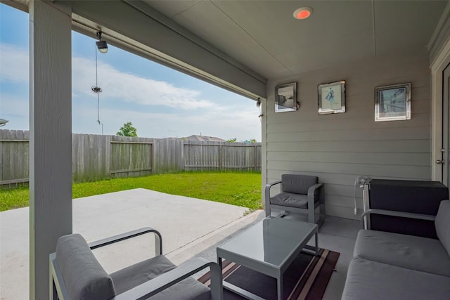 view of patio featuring a fenced backyard and outdoor lounge area