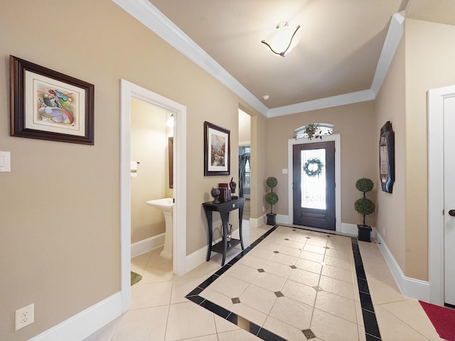 foyer entrance with light tile patterned flooring, baseboards, and ornamental molding