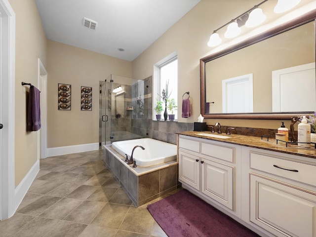 full bathroom with vanity, baseboards, a shower stall, visible vents, and a bath