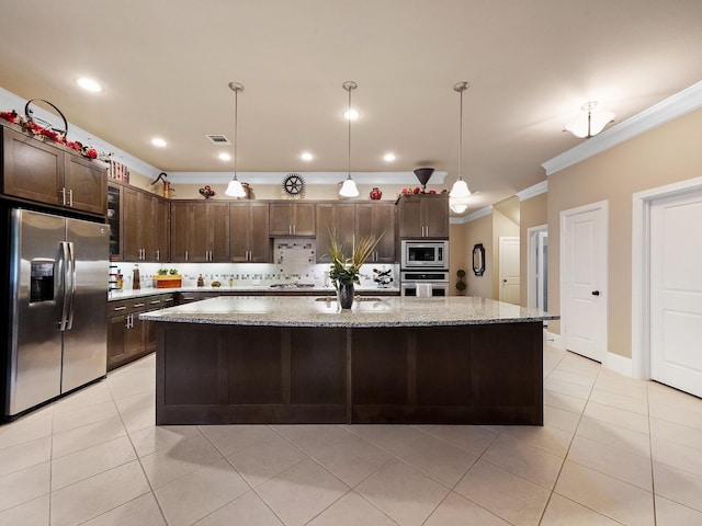 kitchen with crown molding, appliances with stainless steel finishes, light tile patterned flooring, and dark brown cabinets
