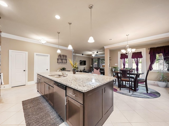 kitchen featuring crown molding, dishwasher, baseboards, a sink, and light tile patterned floors