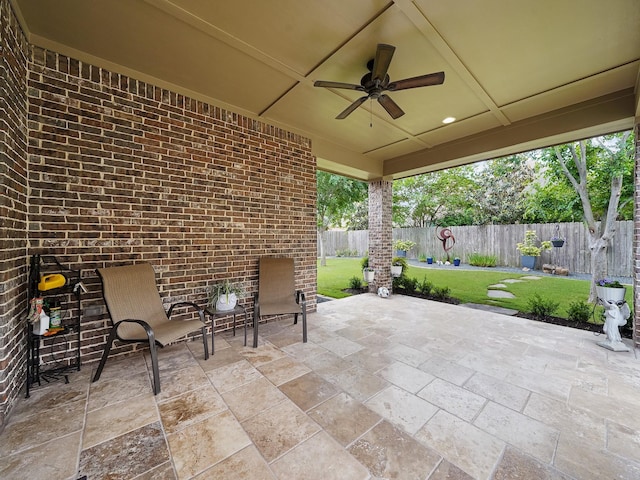view of patio featuring a ceiling fan and a fenced backyard