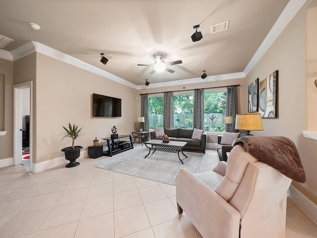 living area with a ceiling fan, visible vents, crown molding, light tile patterned floors, and baseboards